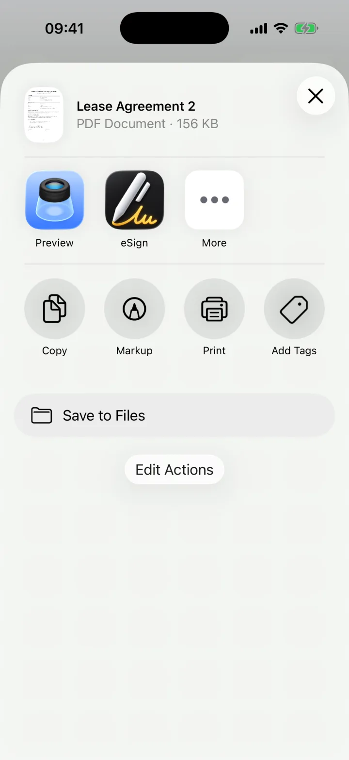 The iOS share sheet with the signed Lease Agreement PDF